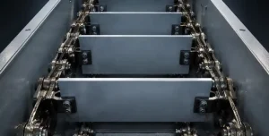 نوار نقاله زنجیری (Chain Conveyor) چیست؟ راهنمای کامل کاربرد و ساختار 3 عکس داخل مقاله نوار نقاله زنجیری (Chain Conveyor) چیست؟ راهنمای کامل کاربرد و ساختار